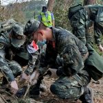 china-plane-crash-rescuers-find-charred-personal-belongings
