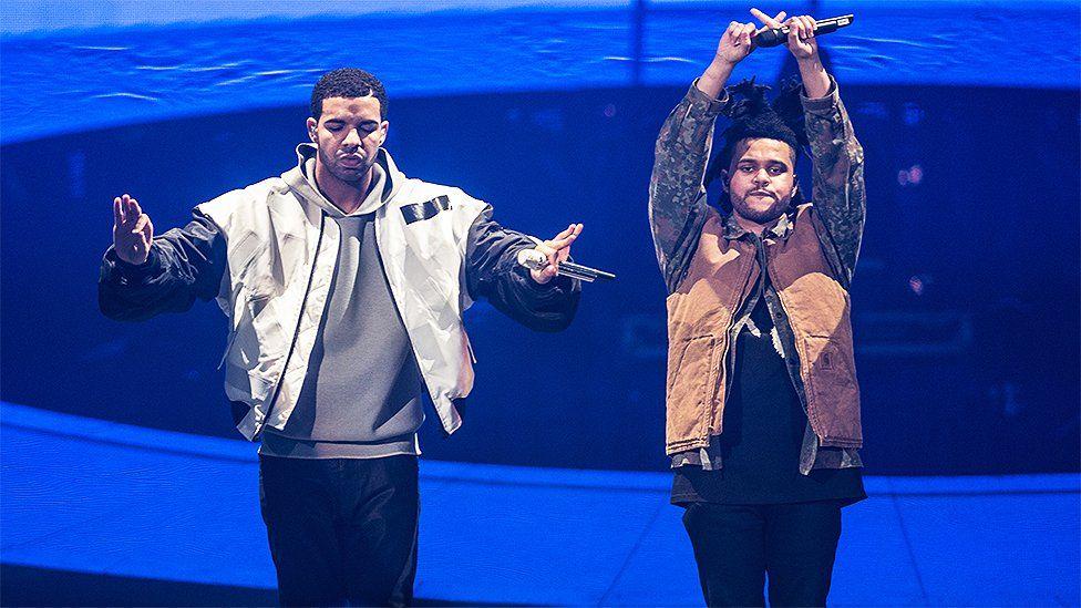 Drake and The Weeknd performing in 2014